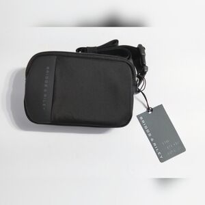 NWT. Briggs & Riley Black Sling Bag for Men. 5×7.5×1.75